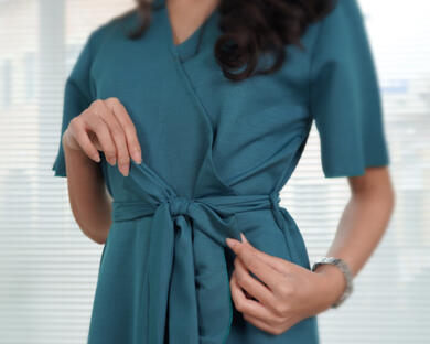 The detail product of Sandra Dress in turquoise color, ribbon detailed